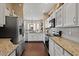 Spacious kitchen features stainless steel appliances and an open layout at 16420 N Thompson Peak Pkwy # 1002, Scottsdale, AZ 85260