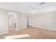 Spacious bedroom with wood-style floors and neutral paint, offering a versatile living space at 16527 W Ironwood St, Surprise, AZ 85388