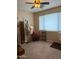 Bright bedroom featuring stylish decor, mannequins, and clothing rack at 16820 E La Montana Dr # 105, Fountain Hills, AZ 85268