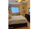 Bright bedroom with a comfortable bed and stylish decor at 16820 E La Montana Dr # 105, Fountain Hills, AZ 85268