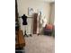 Bright bedroom featuring stylish decor, mannequins, and clothing rack at 16820 E La Montana Dr # 105, Fountain Hills, AZ 85268