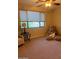 Neutral bedroom with carpet, lamp, teddy bear and sitting chair at 16820 E La Montana Dr # 105, Fountain Hills, AZ 85268