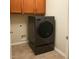 A modern laundry room featuring new LG washer and dryer and a tiled floor at 16820 E La Montana Dr # 105, Fountain Hills, AZ 85268