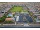 Aerial view of the community's shared amenities, with pool, courts, and parking at 18021 W Avenida Del Sol --, Surprise, AZ 85387