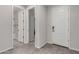 Open entryway features modern tile flooring, and access to other rooms of the home at 18021 W Avenida Del Sol --, Surprise, AZ 85387