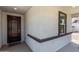 Exterior of the home showing the front door and surrounding outdoor space at 18021 W Avenida Del Sol --, Surprise, AZ 85387