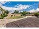 Landscaped backyard featuring a stone pathway and manicured garden, perfect for entertaining at 1915 S Ponderosa Dr, Gilbert, AZ 85295