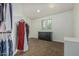 Spacious walk-in closet with custom shelving and ample storage space for clothing and accessories at 1915 S Ponderosa Dr, Gilbert, AZ 85295