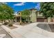 Stunning two-story home with an attached garage and driveway, surrounded by well-maintained landscaping at 1915 S Ponderosa Dr, Gilbert, AZ 85295