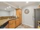 Well-maintained kitchen featuring granite countertops, stainless steel appliances and stylish cabinets at 2025 E Campbell Ave # 107, Phoenix, AZ 85016