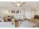 Comfortable living room featuring a plush sectional sofa, a decorative coffee table, and bright natural light at 2025 E Campbell Ave # 107, Phoenix, AZ 85016