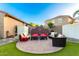 Inviting backyard offers a serene space for lounging and grilling at 21084 E Cherrywood Dr, Queen Creek, AZ 85142