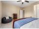 Primary bedroom with nice furnishings, neutral walls, and view to closet at 21084 E Cherrywood Dr, Queen Creek, AZ 85142