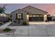 Beautiful home with a well-kept yard, desert landscaping, and a spacious three-car garage at 21084 E Cherrywood Dr, Queen Creek, AZ 85142