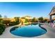 Sparkling backyard pool with ample patio space, ideal for outdoor entertaining and relaxation at 21084 E Cherrywood Dr, Queen Creek, AZ 85142
