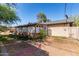 View of backyard showing fence, brick walkway, and potential for outdoor enjoyment and landscaping at 2114 N 69Th Pl, Scottsdale, AZ 85257