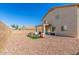 Backyard featuring gravel and a playground at 2152 W Sunshine Butte Dr, San Tan Valley, AZ 85144