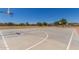 Outdoor basketball court in a well-kept community park, ideal for sports and recreation at 2152 W Sunshine Butte Dr, San Tan Valley, AZ 85144