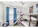 room features a bunkbed with a built-in slide and natural light at 2152 W Sunshine Butte Dr, San Tan Valley, AZ 85144
