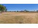 Expansive community park with open fields and mountain views, great for outdoor activities at 2152 W Sunshine Butte Dr, San Tan Valley, AZ 85144