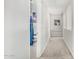 Upstairs hallway view showing a bedroom with fun decor at 2152 W Sunshine Butte Dr, San Tan Valley, AZ 85144