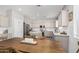 Spacious eat-in kitchen features stainless steel appliances and subway tile backsplash at 2152 W Sunshine Butte Dr, San Tan Valley, AZ 85144