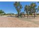 Well-equipped community playground with a shaded picnic area, creating a Gathering-friendly recreation spot at 2152 W Sunshine Butte Dr, San Tan Valley, AZ 85144