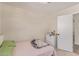 Cozy bedroom showcasing a twin bed, white dresser, and inviting natural light at 22534 W Pima St, Buckeye, AZ 85326