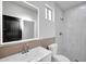 Modern bathroom featuring vanity with sleek mirror and walk-in shower at 22548 W Huntington Dr, Buckeye, AZ 85326