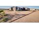 Beautiful single-story house with drought resistant landscaping at 22548 W Huntington Dr, Buckeye, AZ 85326