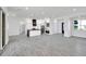 Open concept kitchen with stylish countertops, modern lighting, and sleek cabinetry at 22548 W Huntington Dr, Buckeye, AZ 85326