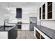 Well-lit kitchen featuring modern appliances, ample counter space, and stylish cabinetry at 22548 W Huntington Dr, Buckeye, AZ 85326