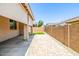 Backyard view showing covered patio and privacy wall at 24953 N 172Nd Dr, Surprise, AZ 85387