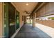 Spacious covered patio with ceiling fan and ample room for outdoor living at 24953 N 172Nd Dr, Surprise, AZ 85387
