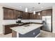 A kitchen with stainless steel appliances, granite countertops, and lots of storage space at 24953 N 172Nd Dr, Surprise, AZ 85387
