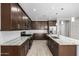A kitchen boasting ample counter space, stainless steel appliances and stylish finishes at 24953 N 172Nd Dr, Surprise, AZ 85387