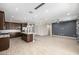 Open floor plan of the kitchen with wood floors and recessed lighting at 24953 N 172Nd Dr, Surprise, AZ 85387