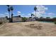 View of the backyard featuring a pool and mature landscaping at 2548 E Encanto St, Mesa, AZ 85213