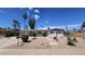 Charming single-story home with desert landscaping, walkway, and covered porch at 2548 E Encanto St, Mesa, AZ 85213