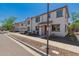 Street view of a townhome with desert landscaping at 2640 N 73Rd Gln, Phoenix, AZ 85035