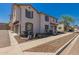 Charming townhome featuring a front-facing garage and low-maintenance desert landscaping at 2640 N 73Rd Gln, Phoenix, AZ 85035