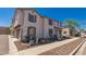 Inviting townhome showcasing well-maintained landscaping and exterior features at 2640 N 73Rd Gln, Phoenix, AZ 85035