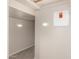 Hallway with carpet and lights along the base of the wall at 2640 N 73Rd Gln, Phoenix, AZ 85035