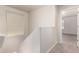 Hallway with natural light with carpet leading to other rooms at 2640 N 73Rd Gln, Phoenix, AZ 85035