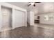 Inviting living room featuring stylish plank flooring and an open floor plan at 2640 N 73Rd Gln, Phoenix, AZ 85035