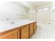 Bright bathroom featuring a long vanity with tile floors and a combined tub and shower at 2783 E Mineral Park Rd, San Tan Valley, AZ 85143