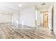 This bright bedroom features wood floors, ceiling fan, and a closet with mirrored sliding doors at 2783 E Mineral Park Rd, San Tan Valley, AZ 85143