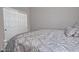 Bedroom featuring neutral-colored bedding and a closet at 3522 W Rushmore Dr, Anthem, AZ 85086