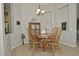 Cozy dining area featuring wood table, chairs, chandelier, and decorative accents at 3522 W Rushmore Dr, Anthem, AZ 85086