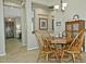 Charming dining area featuring a wooden table and chairs, as well as a decorative hutch at 3522 W Rushmore Dr, Anthem, AZ 85086